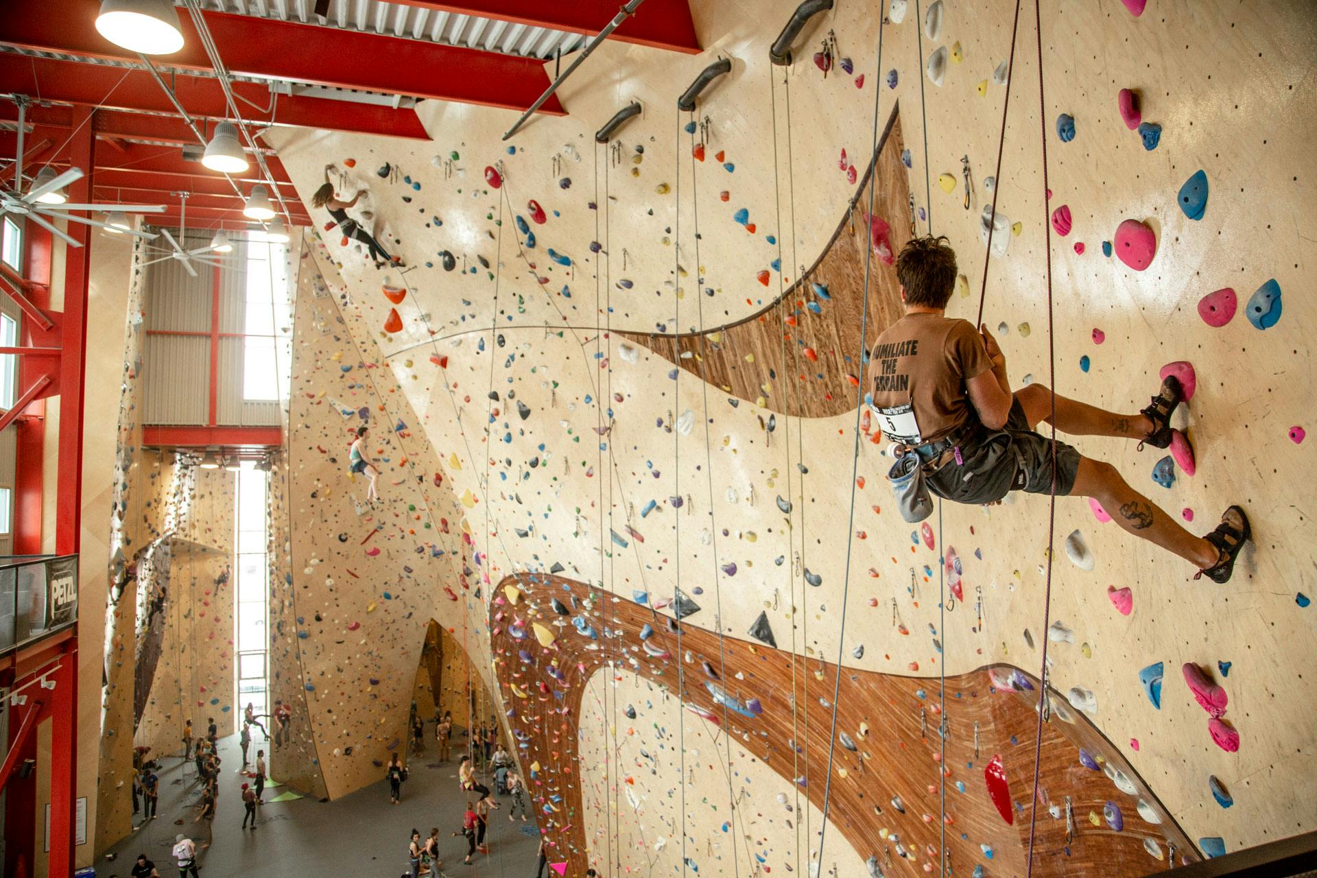 Climbers resting on a large ARC Climbing wall at The Front Climbing Club built by Vertical Solutions