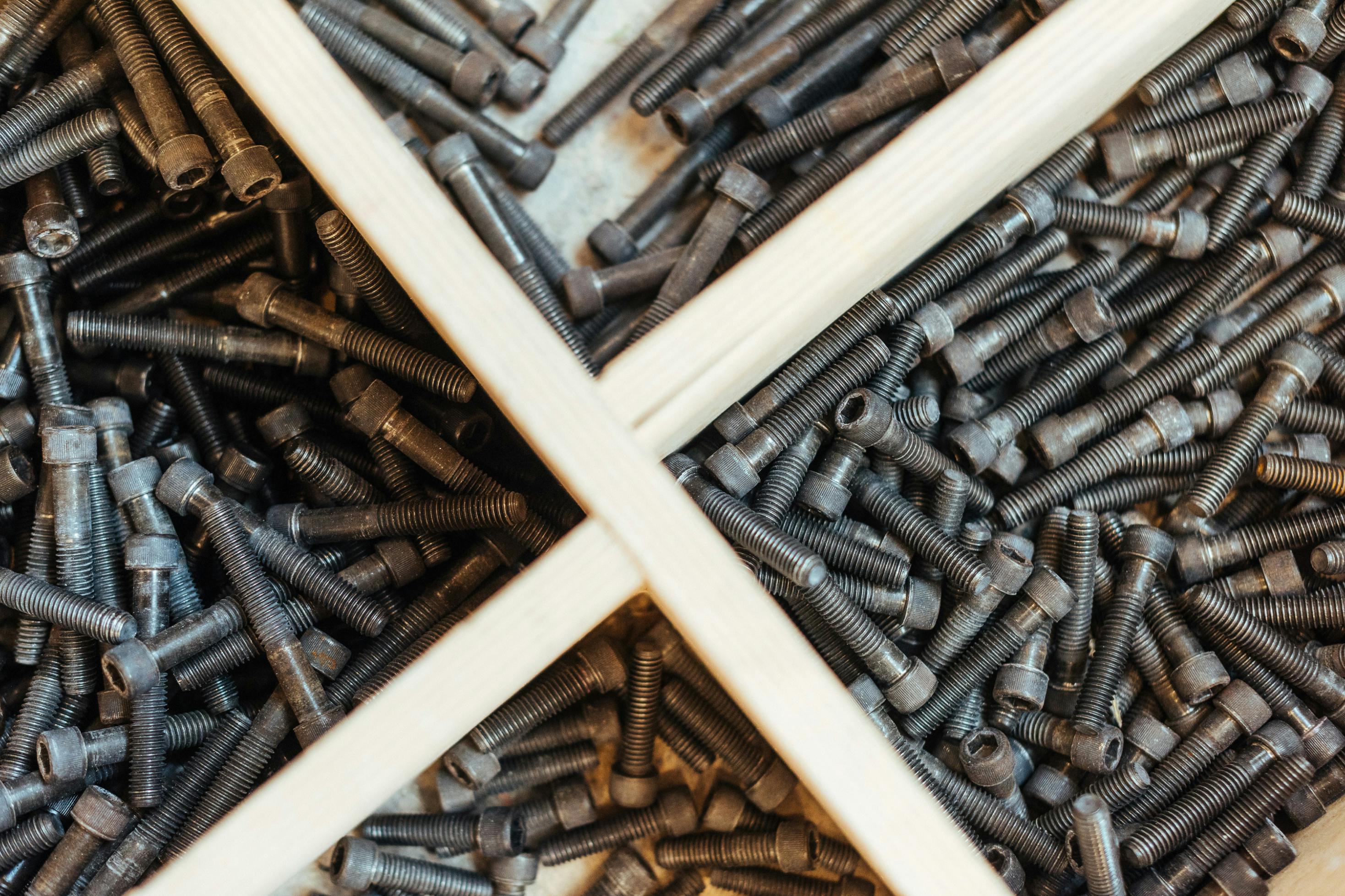 Climbing bolts organized in trays