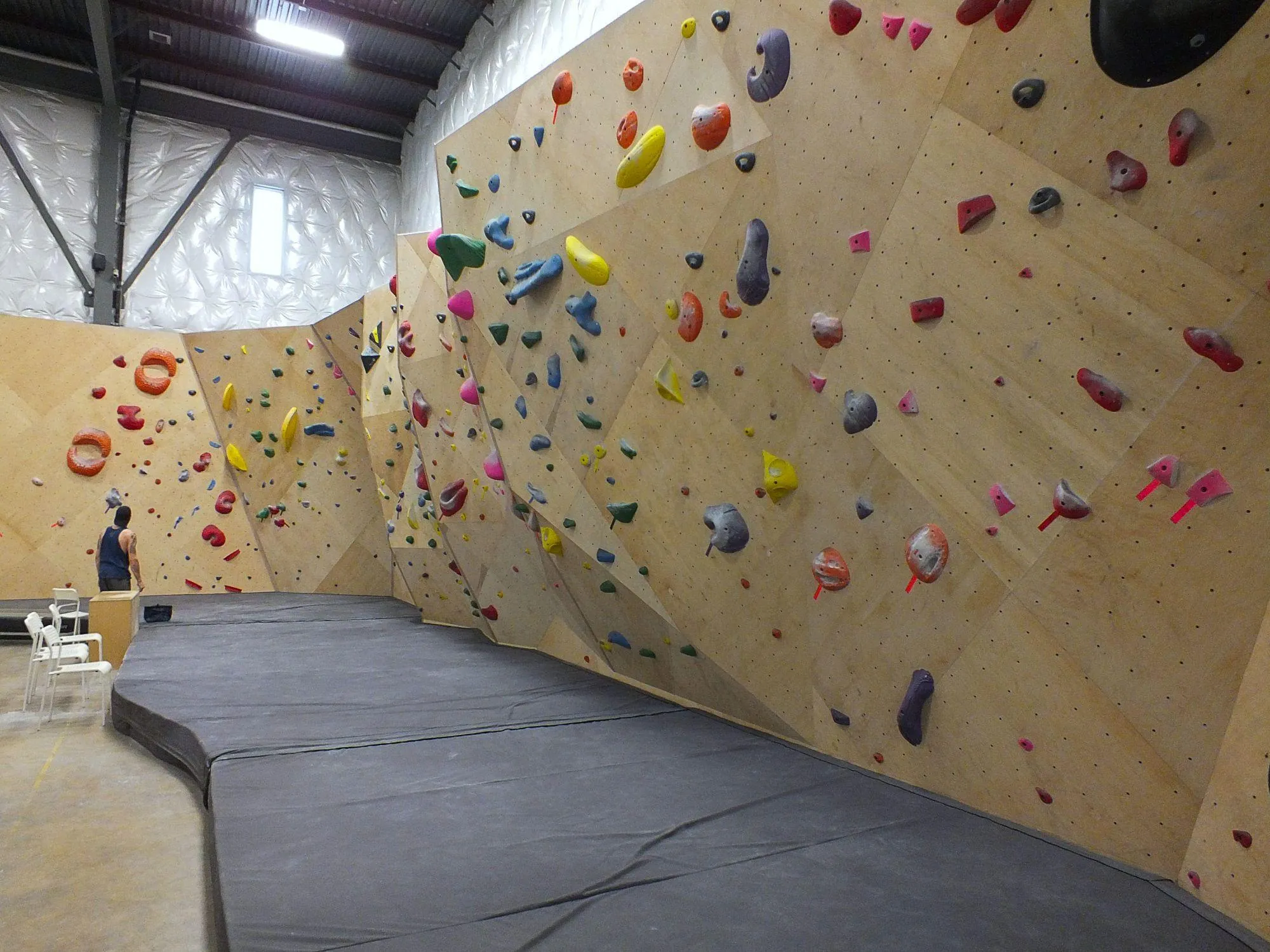 The "Armadillo" wall features several aretes and corners to symbolize the banded ridges of the armadillo's back.