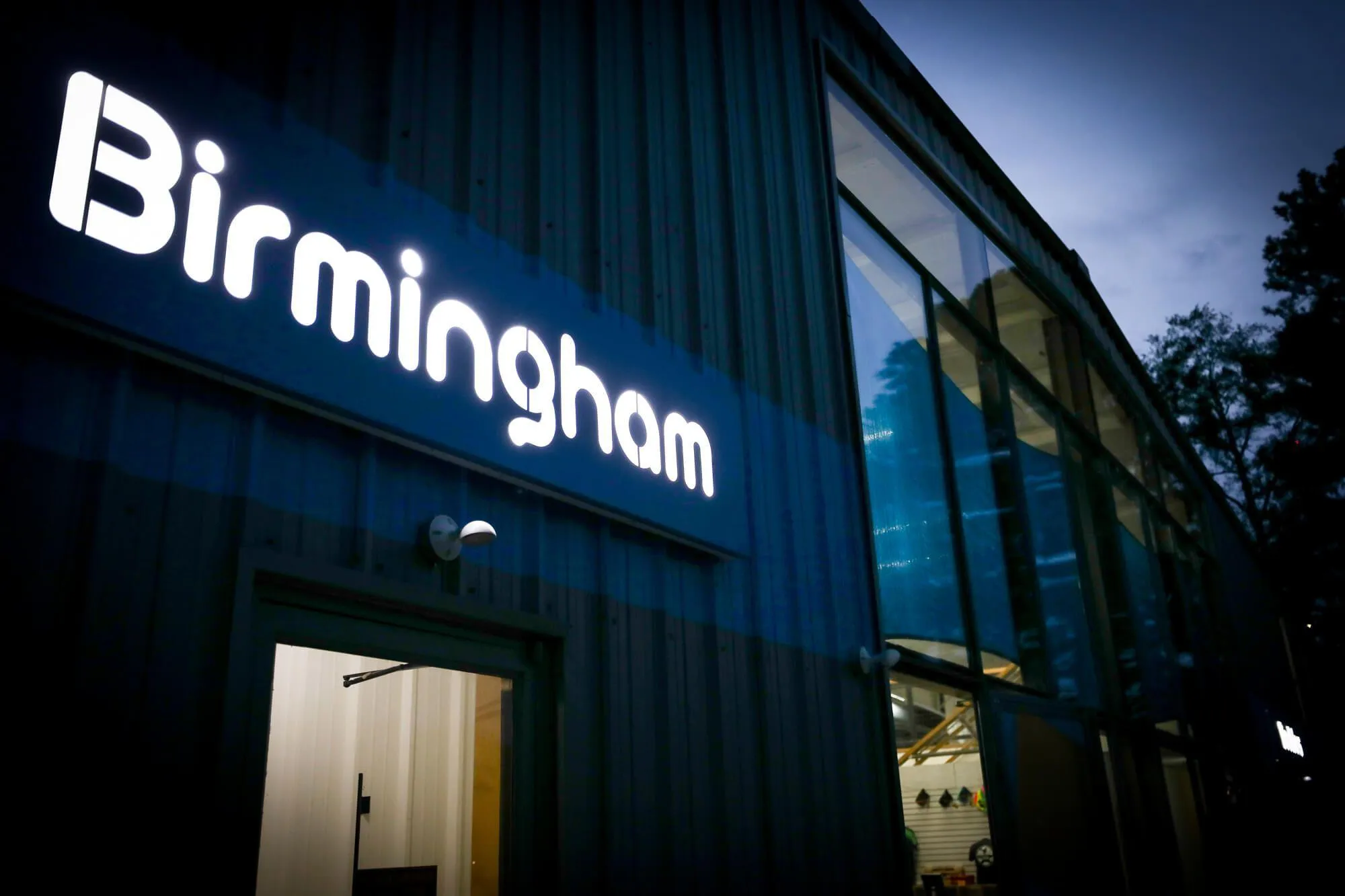 Authentically Birmingham, the facade has gorgeous signage on the outside straddling the glass walls in the center, giving passers-by a peek into what is going on inside.