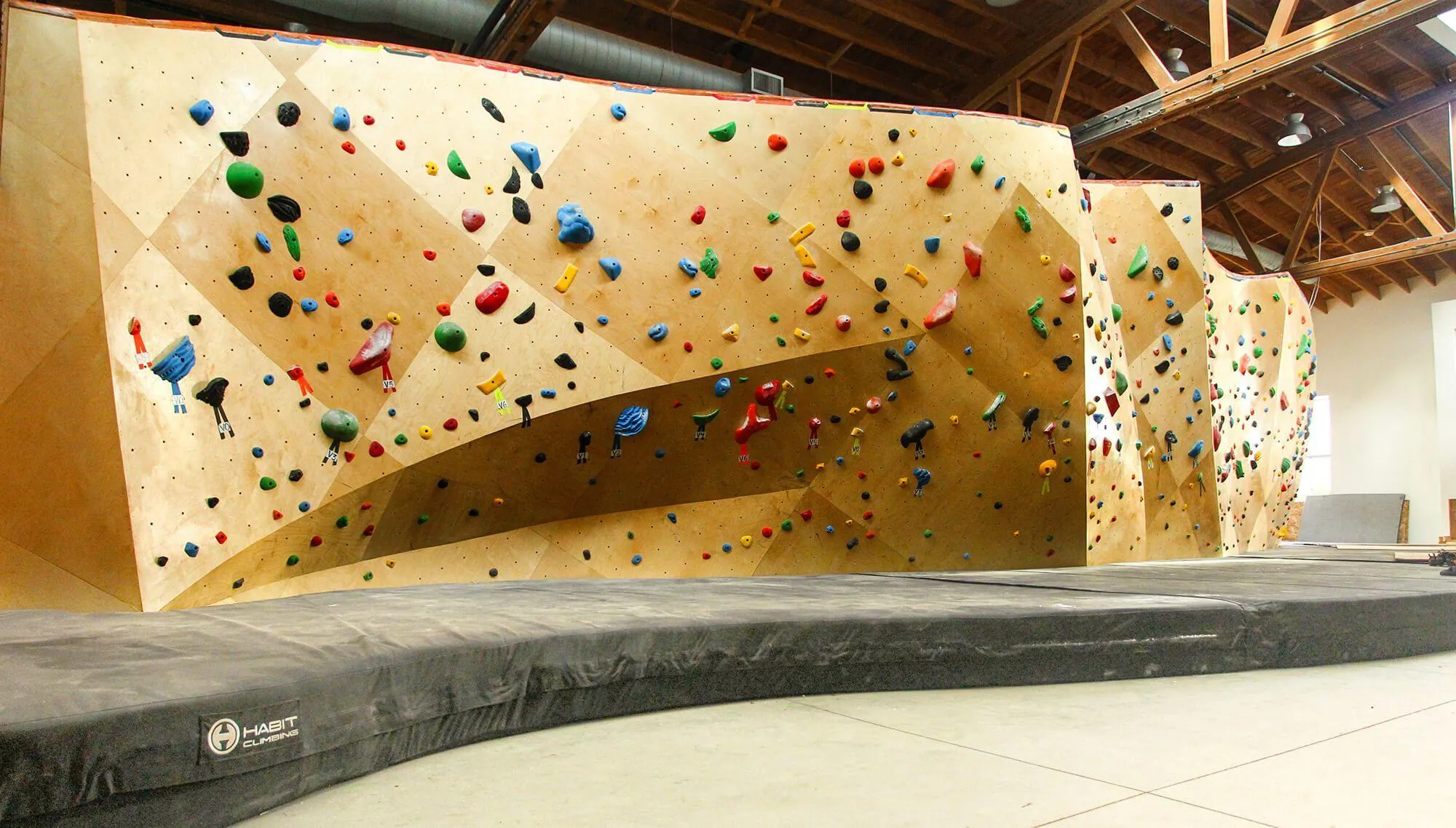 One of the bouldering areas has distinct ridges both vertical and horizontal to visually break up the space, but using ARC wall construction still remains super flowy and part of a bigger overall bouldering system.