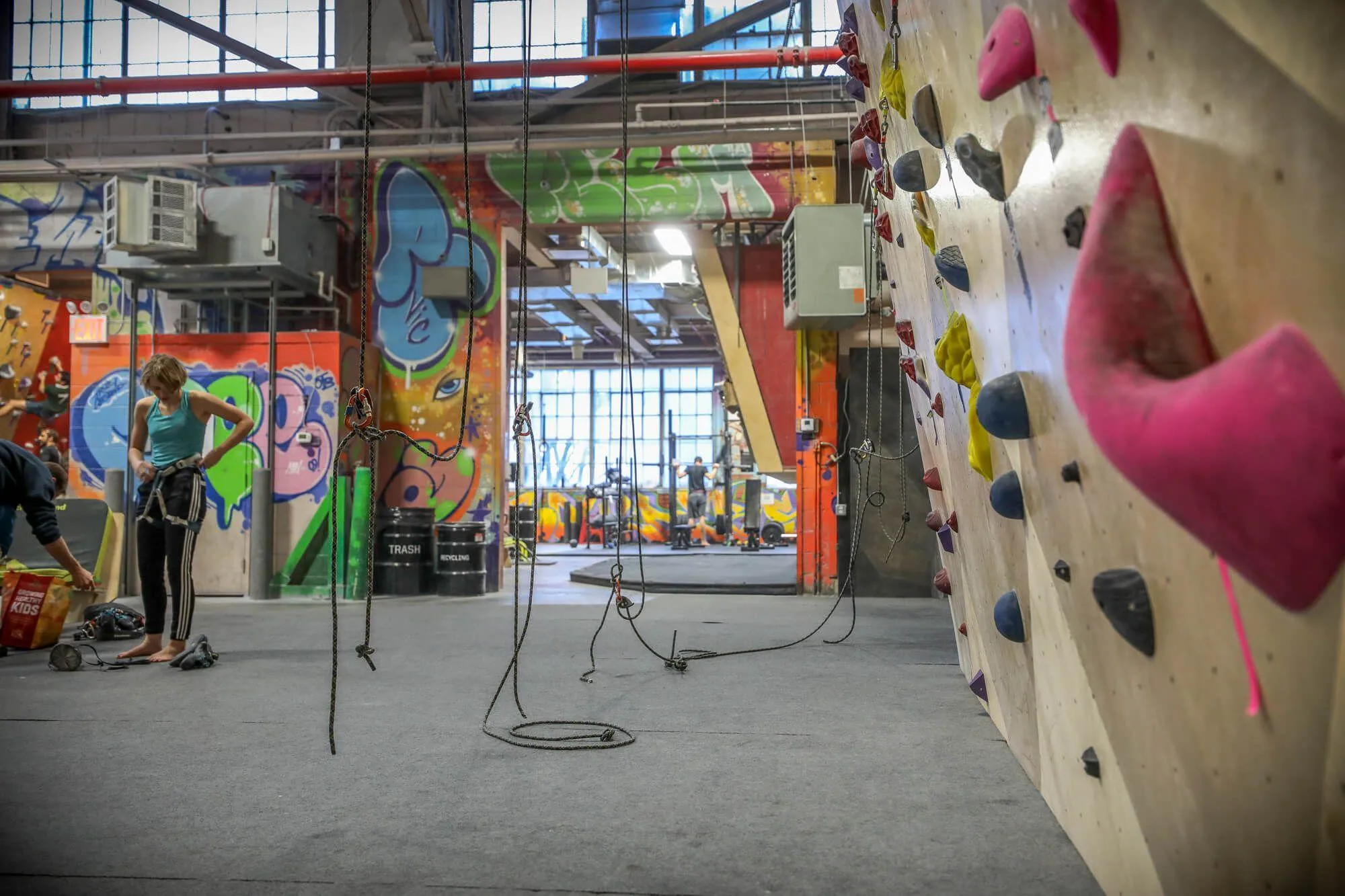 A view down one of the top-rope walls built by Vertical Solutions, into the strength-training rooms. Space is hard to come by in New York City, but BKB made sure that eery area was used efficiently while still allowing enough space to not feel totally cramped during peak hours.