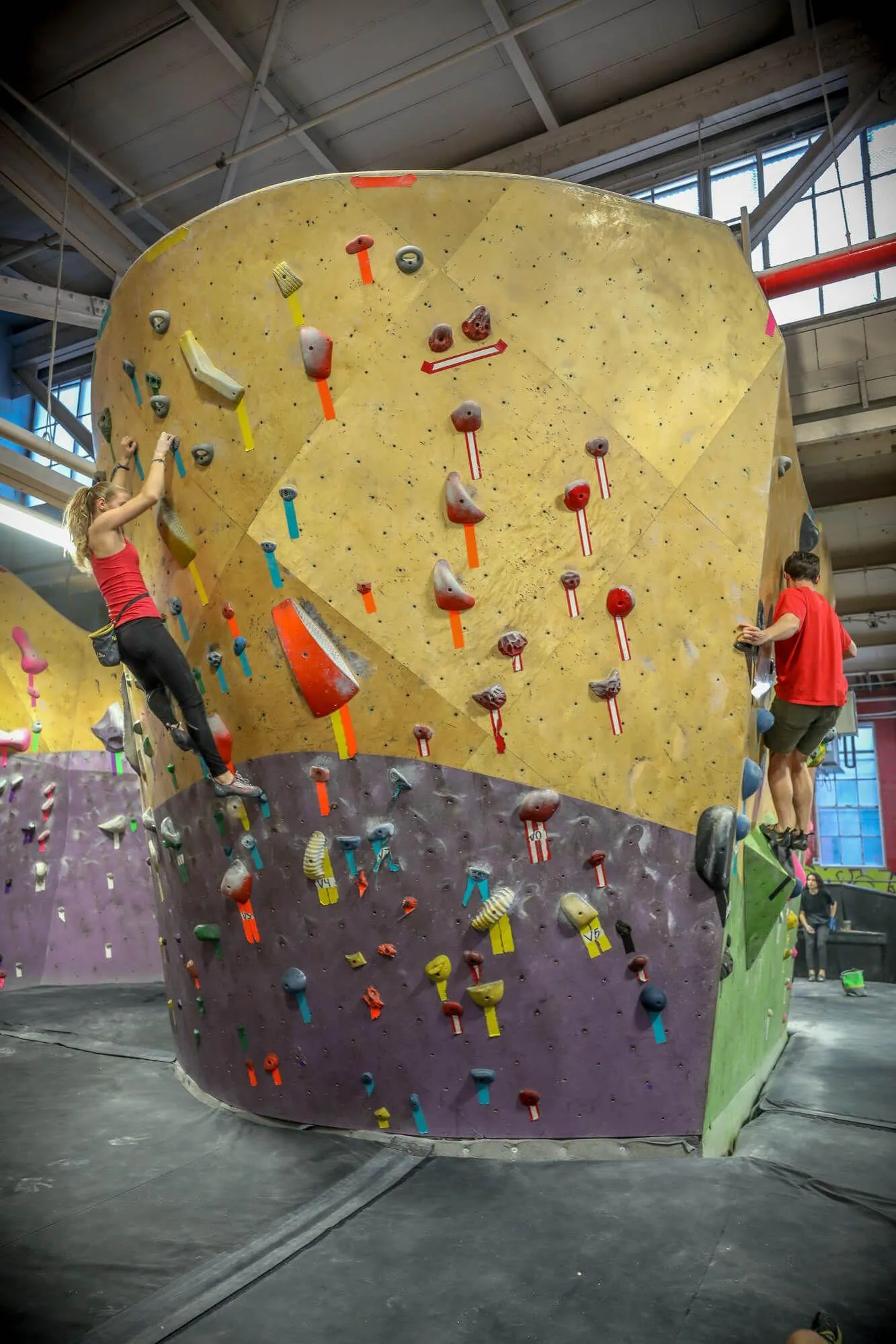 For this special bouldering area, the space was maximized to create a peninsula of walls combining both ARC (curved) and MLM (geometric) wall design/manufacturing styles.