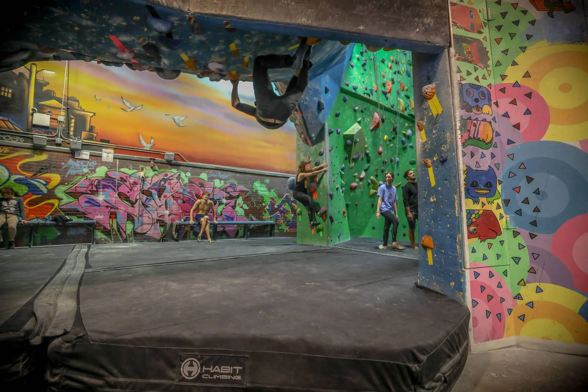 Habit Flooring systems are used throughout the BKB facility to arrest falling climbers even during moves like these. Habit Flooring is engineered specifically to your wall heights to keep climbers safe and reduce potential for injury at your facility.