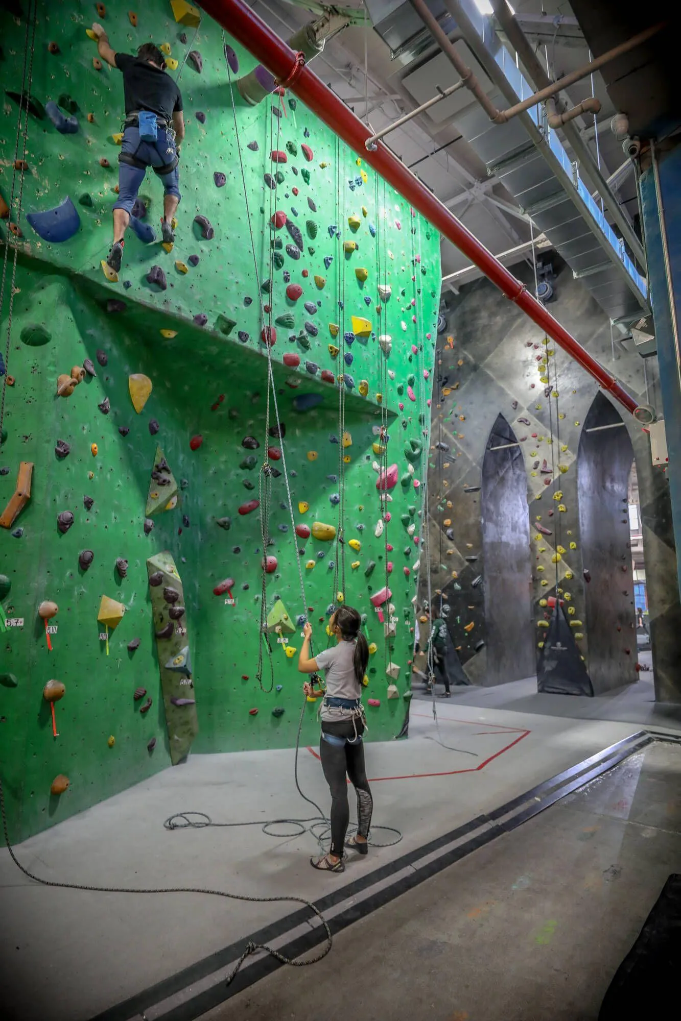 This view shows some of the original owner-built rope climbing walls, including the back side of the iconic Brooklyn Bridge climbing feature.