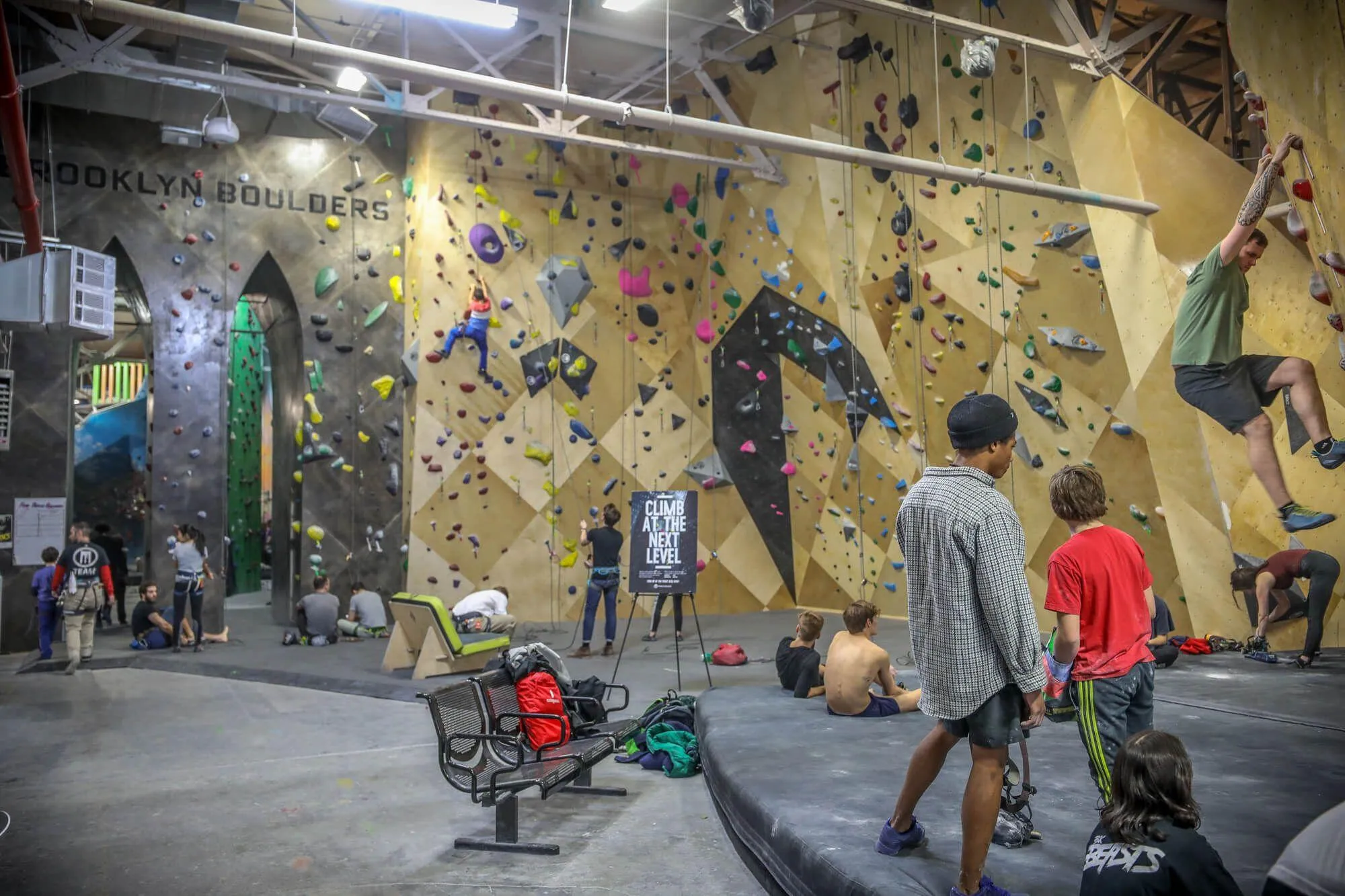 Just beyond the first bouldering peninsula and front desk/staff area, the facility opens up to reveal some impressively high lead and top-rope climbing walls, recently renovated by Vertical Solutions to match walls built at other BKB facilities.