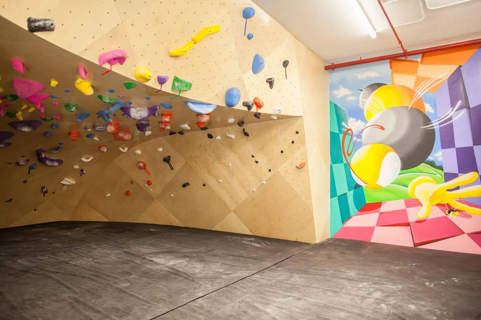 It’s hard to top this super deep ARC wall bouldering cave we built at the Brooklyn Boulders Queensbridge location. This facility had challenging interior volume, and required non-traditional climbing wall design and manufacturing solutions.