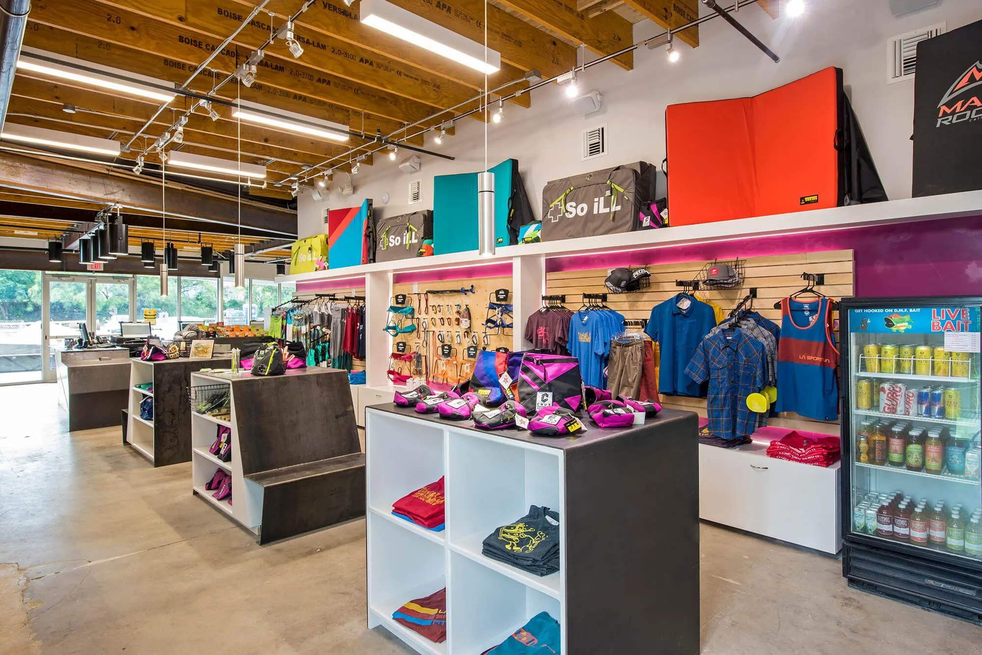 Another view of the retail area at Crux. Vertical Solutions can design and build the display pieces for your retail space, using a variety of materials that matches your gym branding.