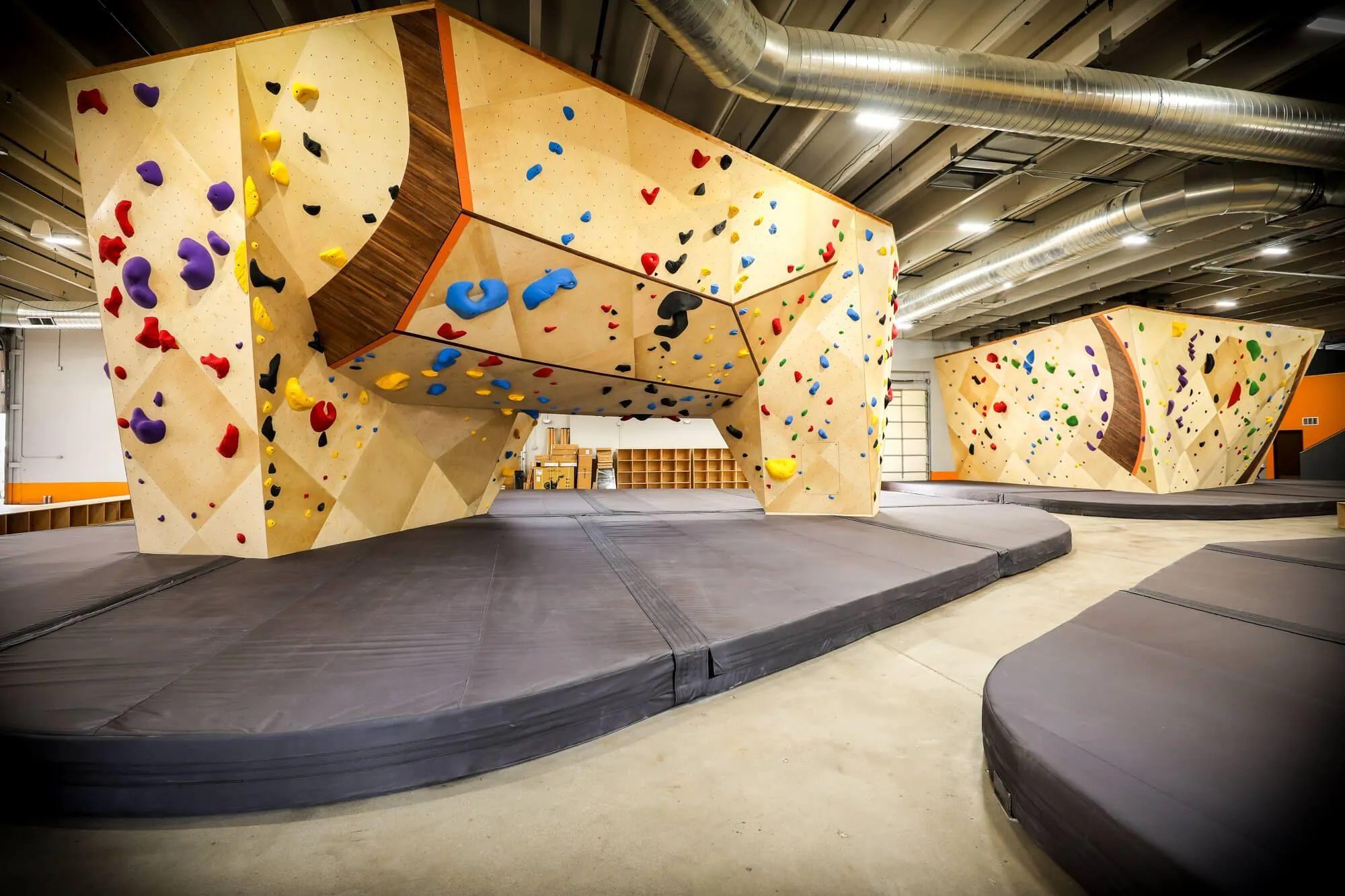 The climbing wall square footage here at LCC is really understated. This huge central freestanding boulder provides not only the most challenging terrain but also the tallest, coming in at 18' tall.