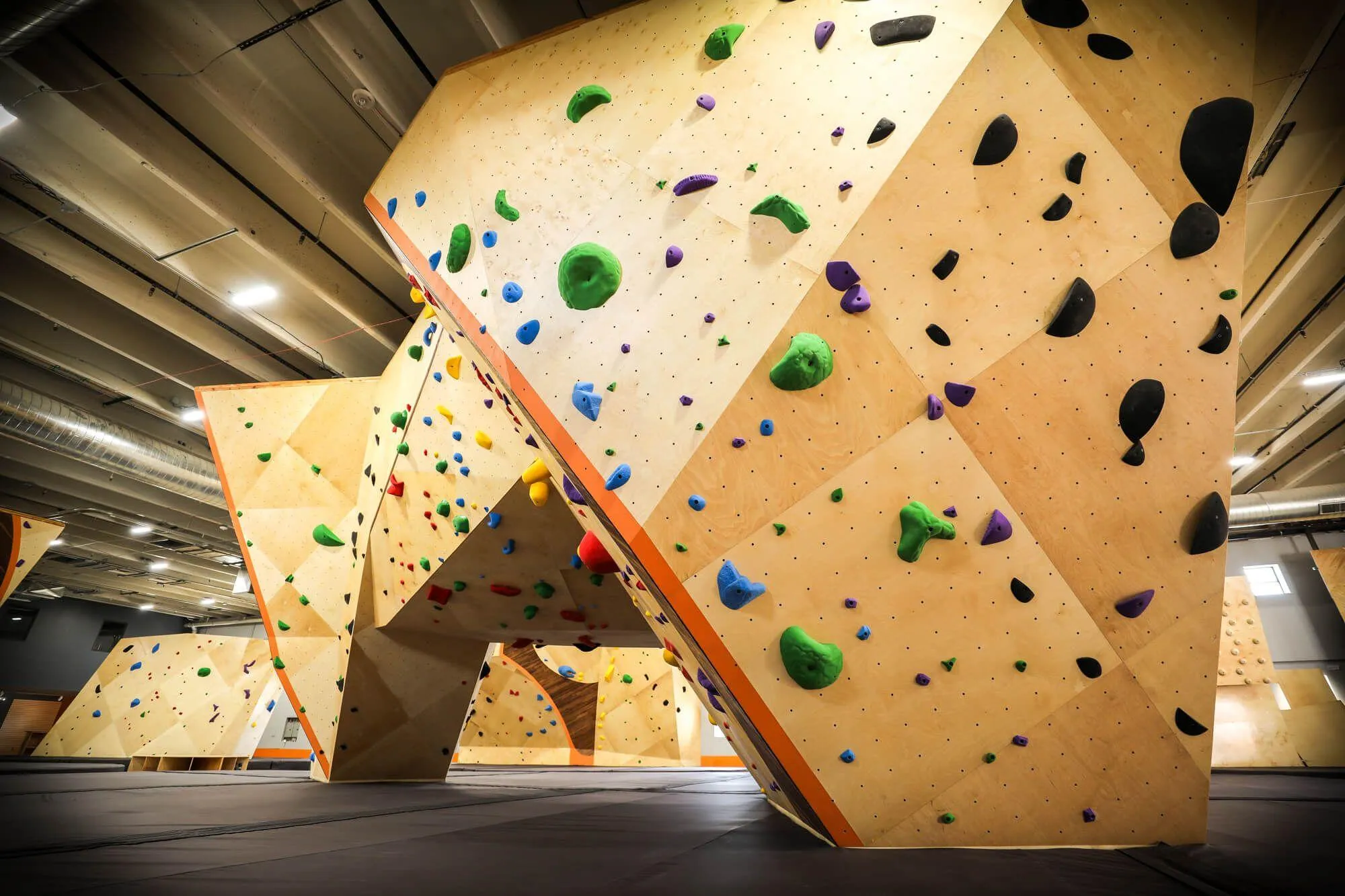 Another view of the main freestanding boulder made of MLM construction. The angles designed by the team were very strategic to provide varying levels of setting on as many facets as possible.