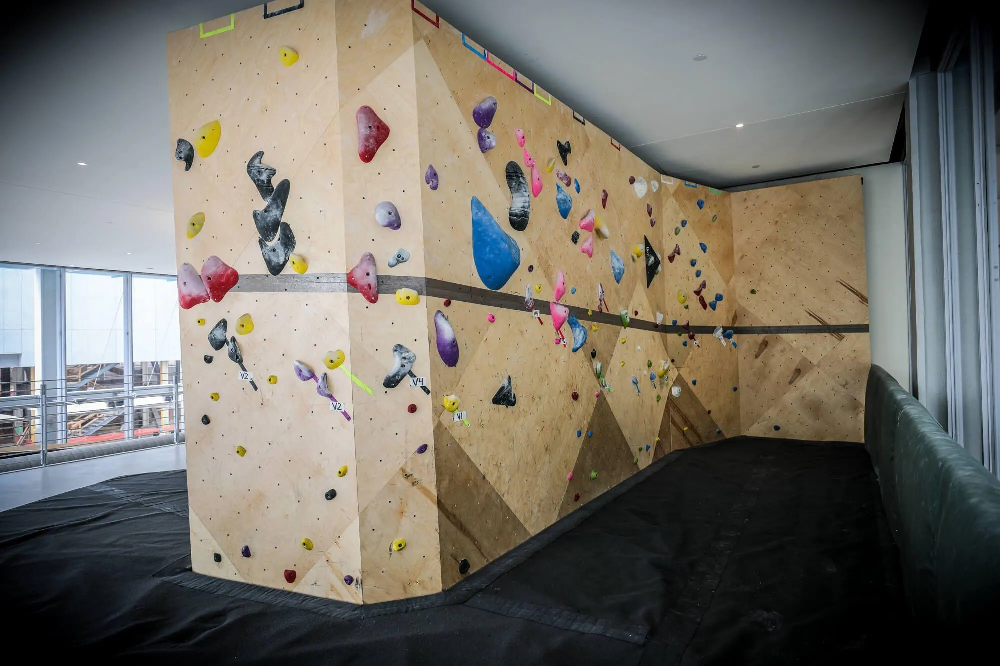 One more angle of the mezzanine bouldering walls upstairs. A hardwood stripe was carried from beginning to end, visually accenting the space.