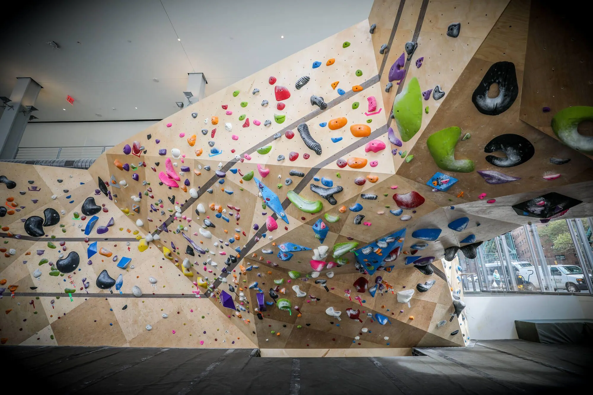 A perpendicular view to the lower bouldering wall which gives you a clear view of the hardwood details designed-in to carry over from each facet to the next.