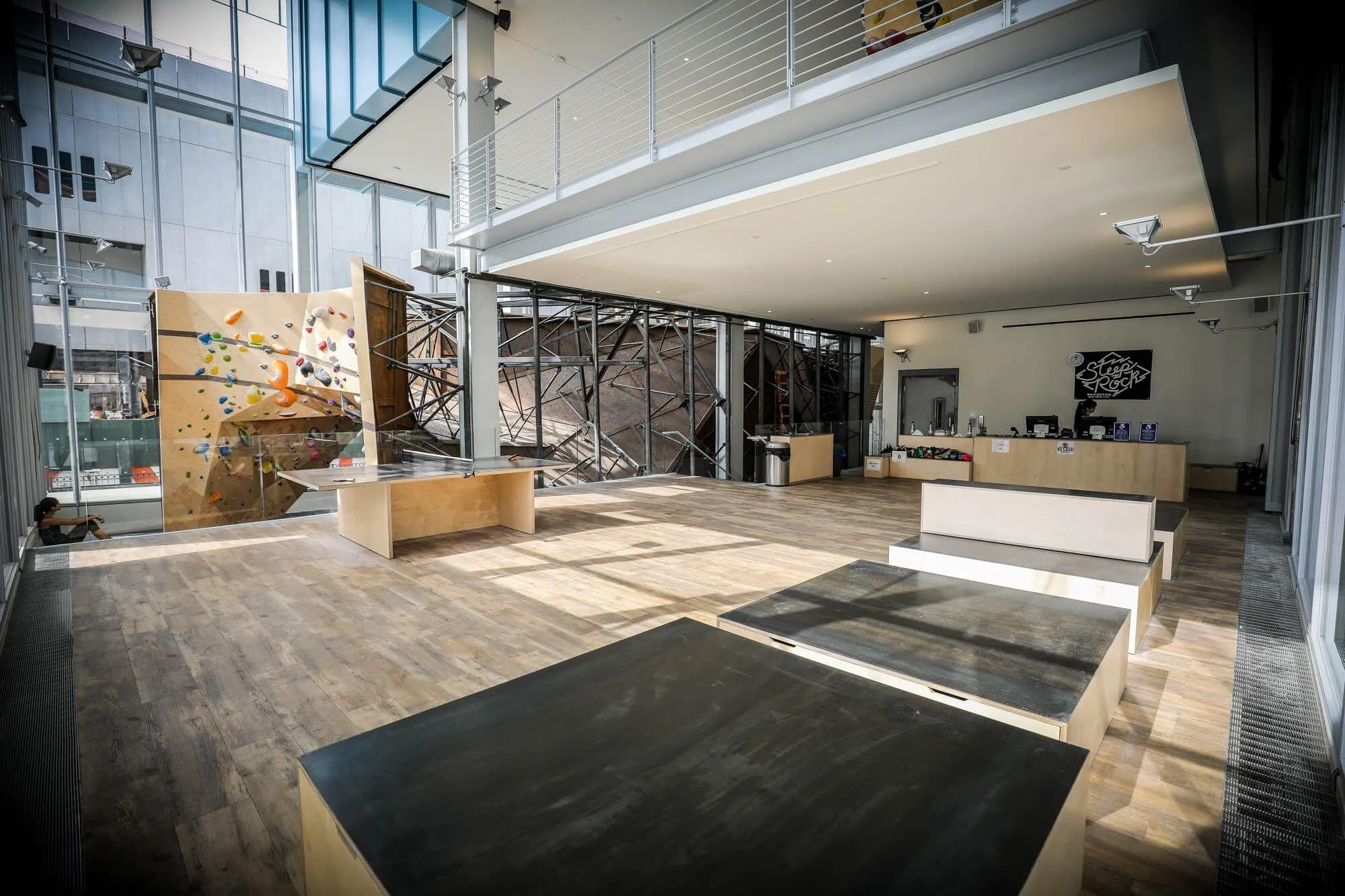 The building Michael Cesari chose for expanding his bouldering gym brand is an incredibly bright and airy location in the Columbia University area. It has two entire walls of exterior windows and substantial clear-height to create a dramatic and open feeling upon entering.