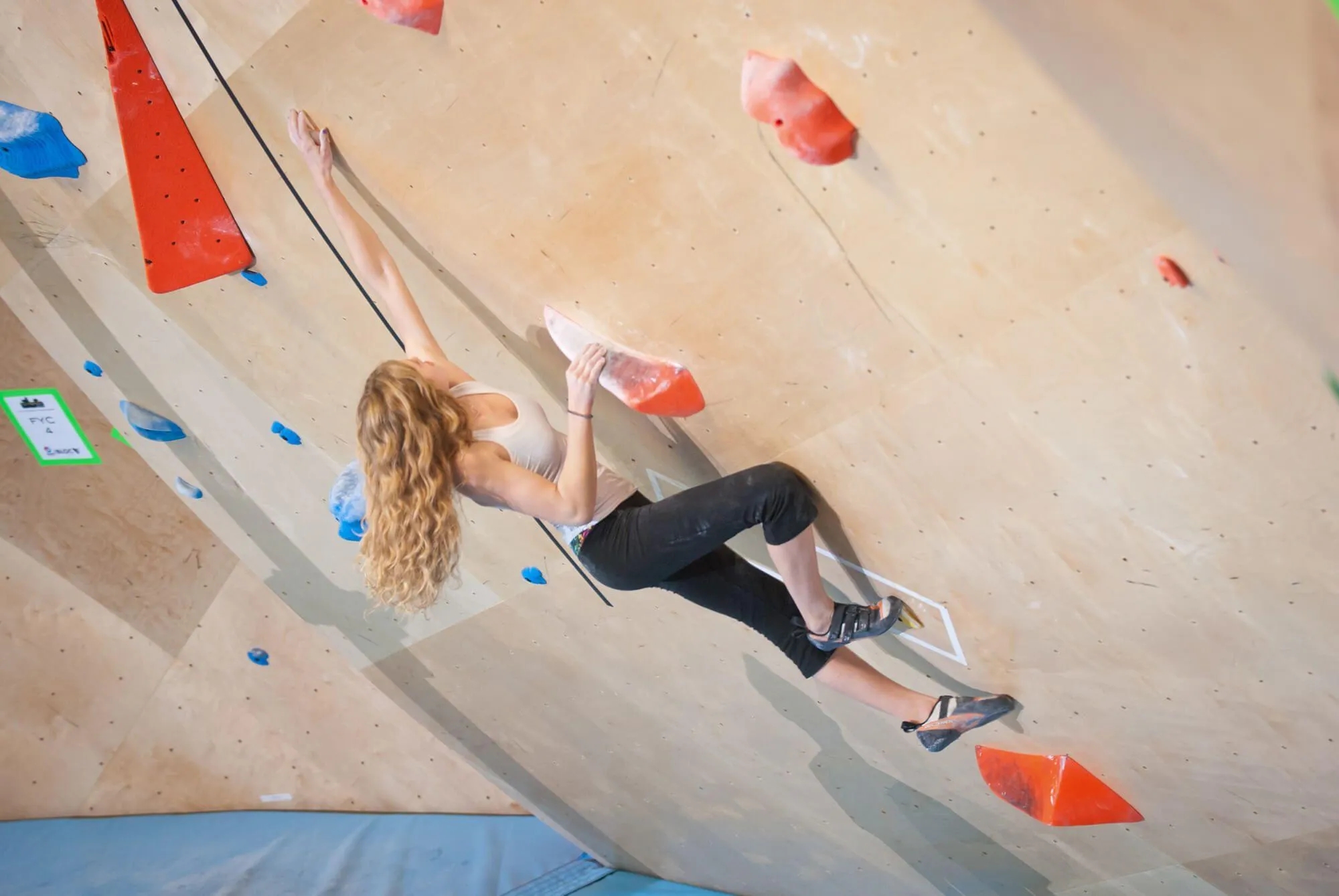 Curved ARC climbing walls like the ones seen here, provide a more aesthetic alternative to geometric wall designs, while still maintaining all of the functionality for setting with volumes and challenging routes that keep your gym fresh.