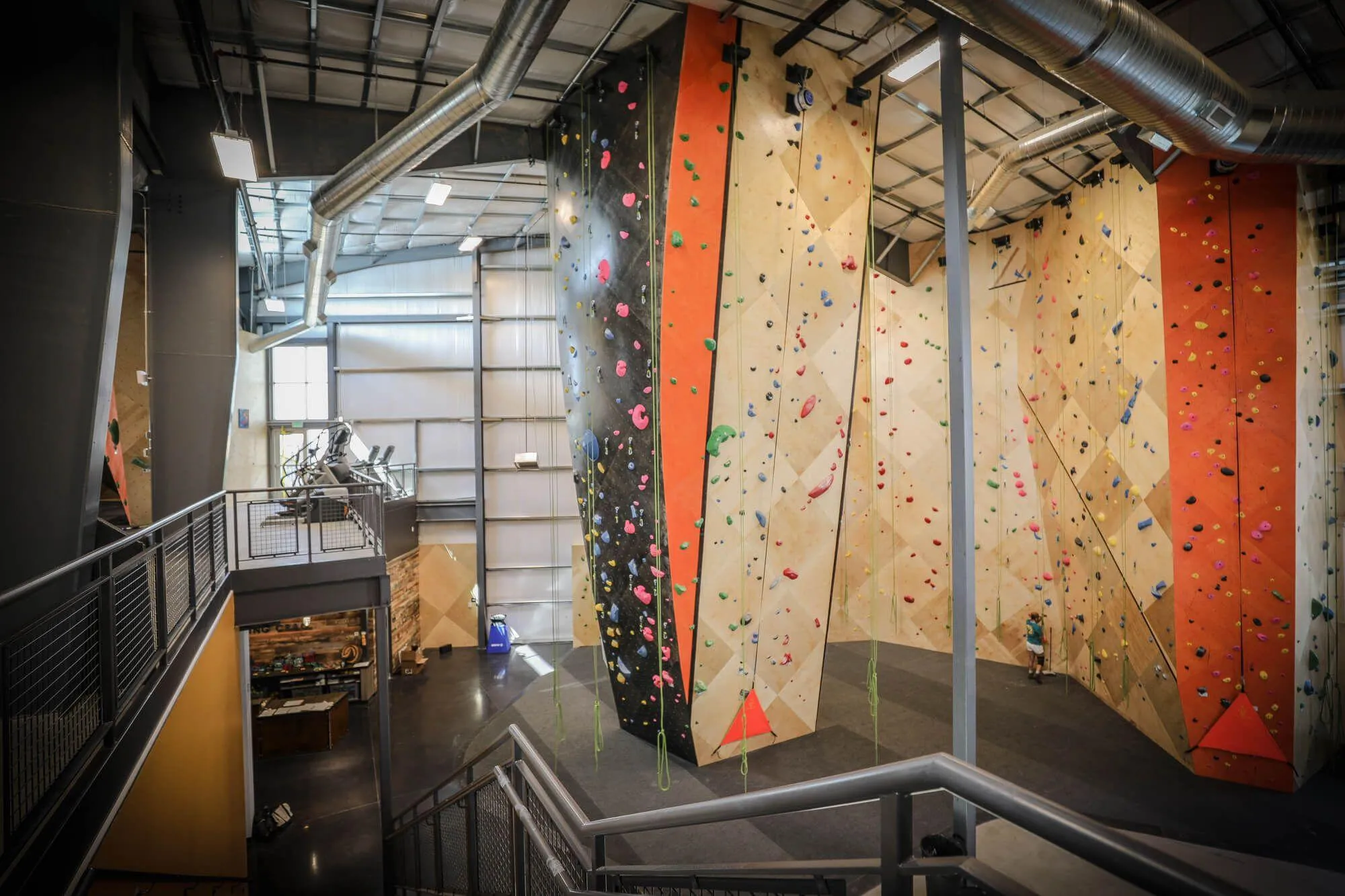 The route climbing walls here are plenty tall, distinctive and spread out, as seen from this second level heading up towards the bouldering walls.
