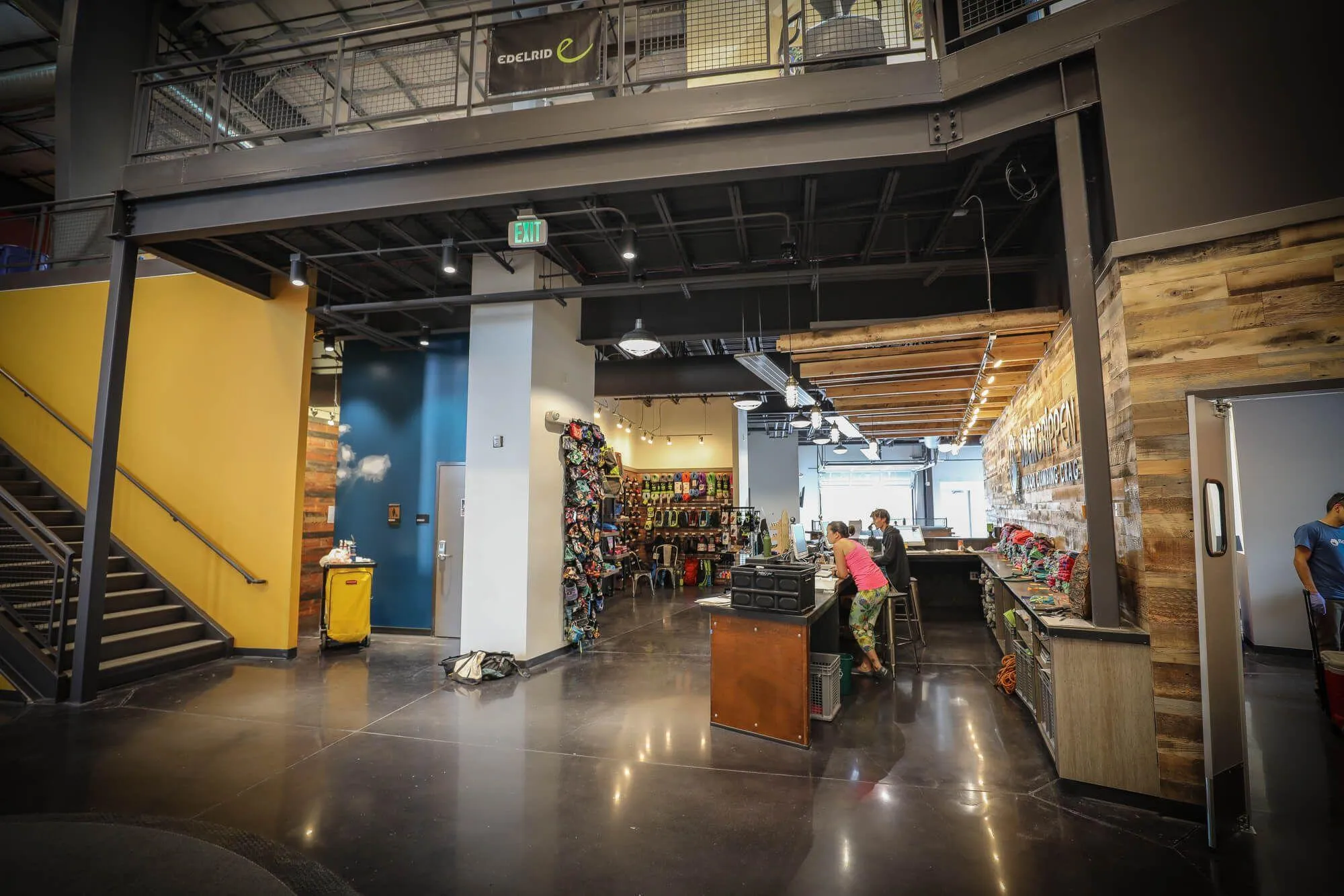 A look back at the main entry area showing the retail gear shop, front desk, and eventually the craft beer bar!